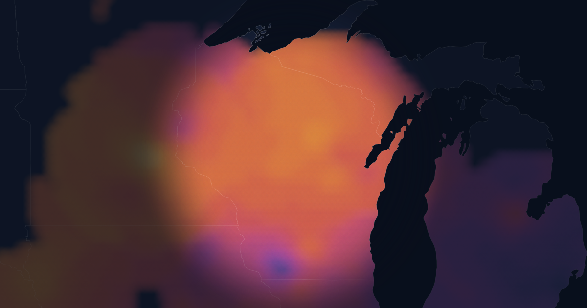 Heatmap of interpolated emergency medicine hourly pay across Wisconsin. Brighter areas indicate higher rates; unmapped areas have too few reports to show.